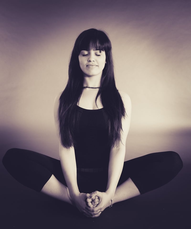 Woman practicing Hatha Yoga